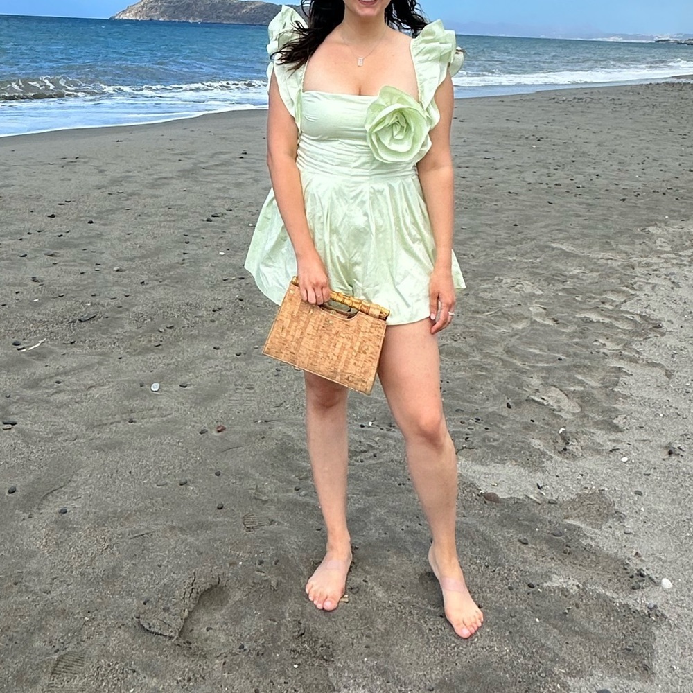 poplin romper with corsage and ruffle sleeves in soft green